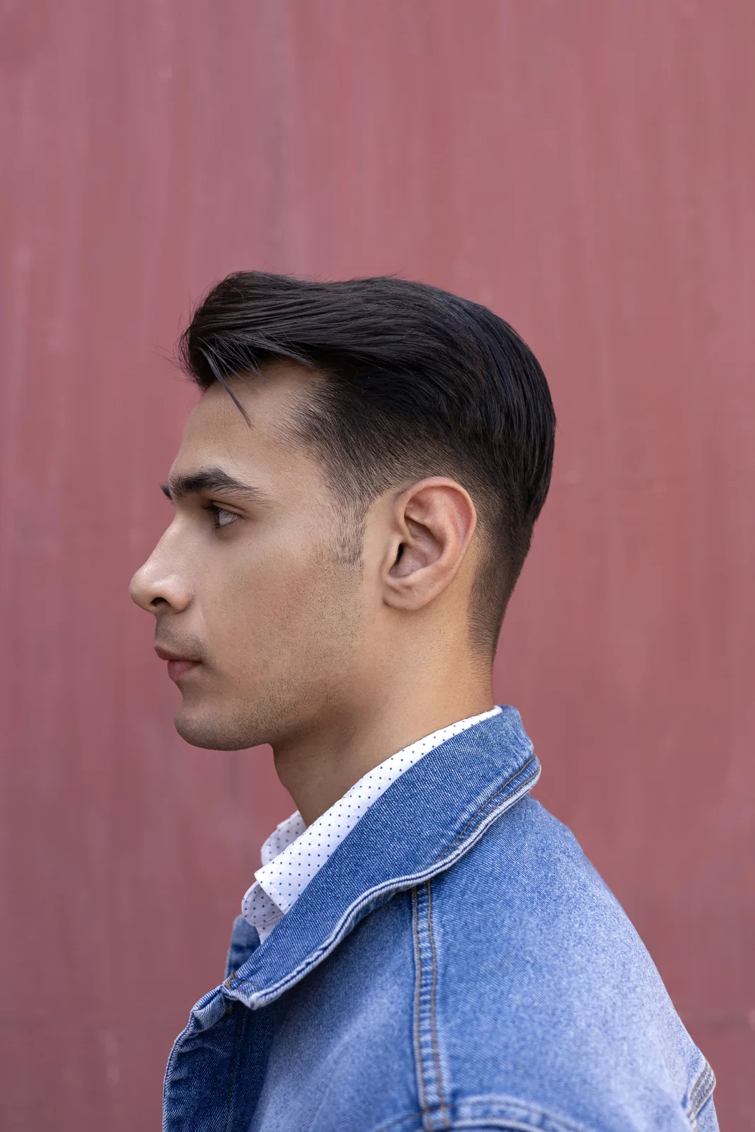 Sagar Shabbir left profile in denim jacket